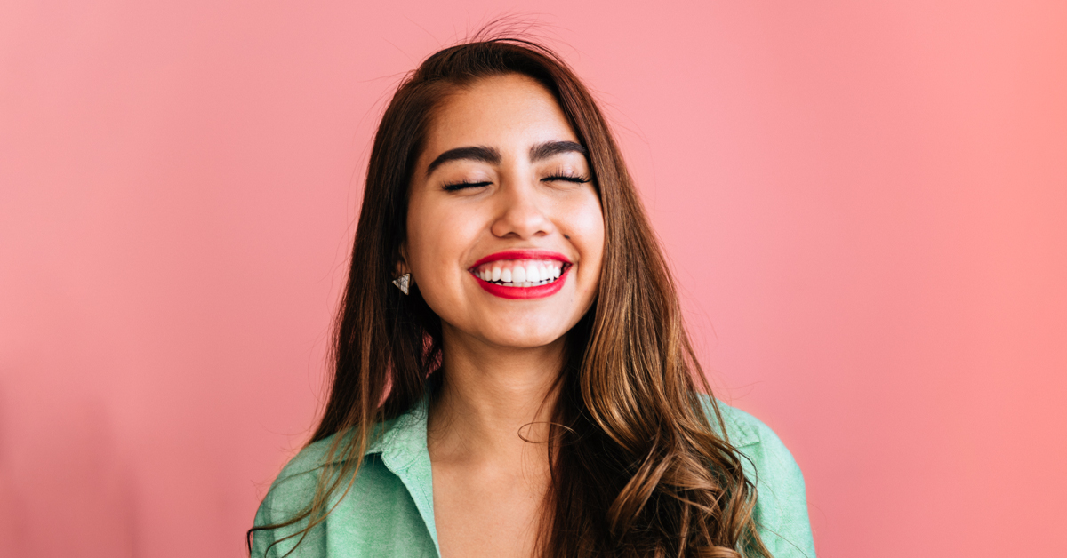 a woman smiling for the camera