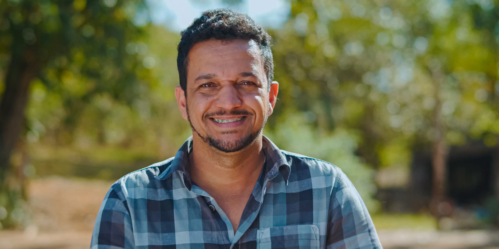 a man smiling for the camera