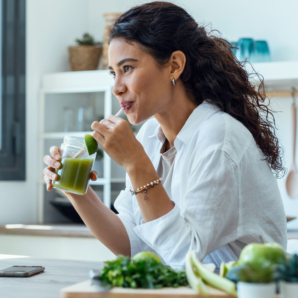a woman eating a plate of food